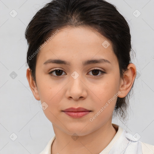 Joyful white child female with medium  brown hair and brown eyes