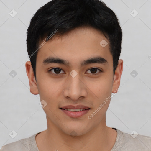 Joyful asian young-adult male with short  black hair and brown eyes