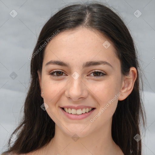 Joyful white young-adult female with long  brown hair and brown eyes