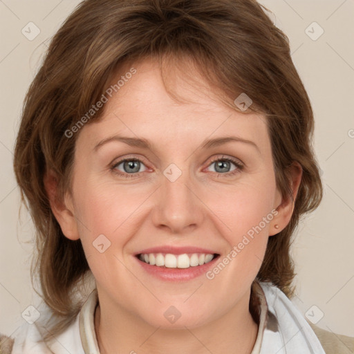 Joyful white young-adult female with medium  brown hair and blue eyes