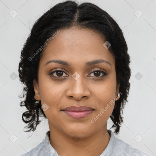 Joyful black young-adult female with long  brown hair and brown eyes