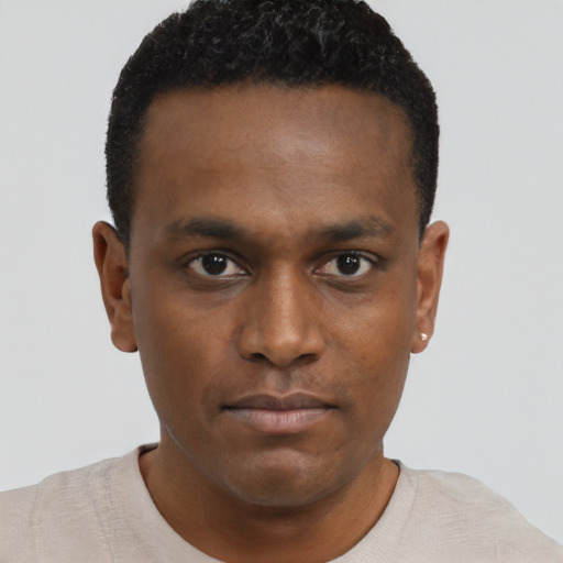 Neutral black young-adult male with short  brown hair and brown eyes