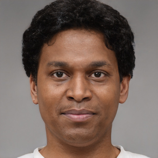 Neutral black young-adult male with short  brown hair and brown eyes