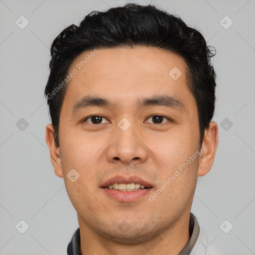 Joyful asian young-adult male with short  black hair and brown eyes