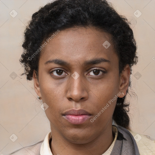 Neutral black young-adult female with short  brown hair and brown eyes