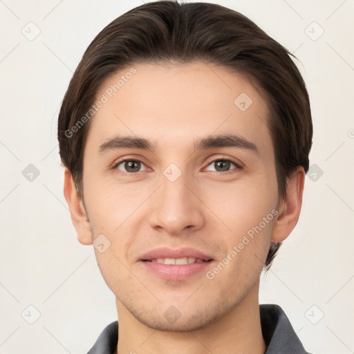 Joyful white young-adult male with short  brown hair and brown eyes