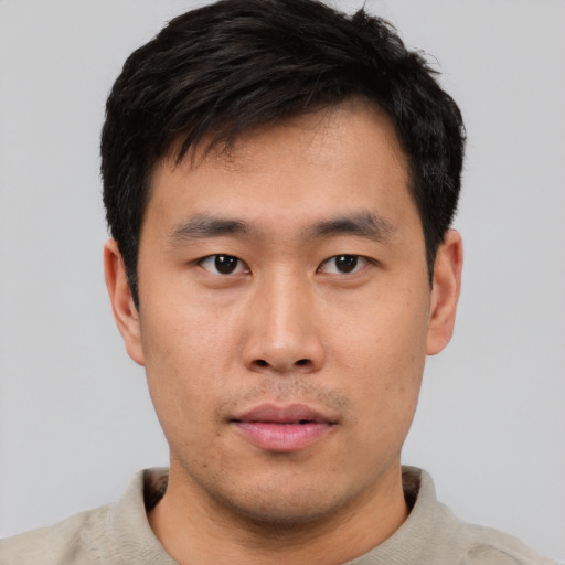 Neutral asian young-adult male with short  black hair and brown eyes