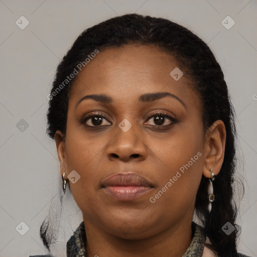 Joyful black young-adult female with medium  black hair and brown eyes