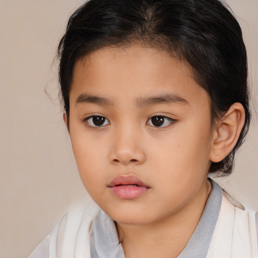Neutral asian child female with medium  brown hair and brown eyes