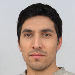 Neutral white young-adult male with short  black hair and brown eyes