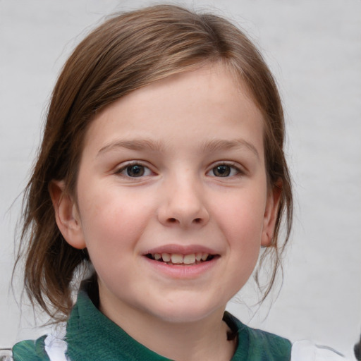 Joyful white child female with medium  brown hair and blue eyes