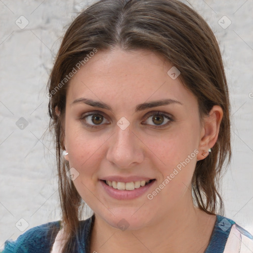 Joyful white young-adult female with medium  brown hair and blue eyes