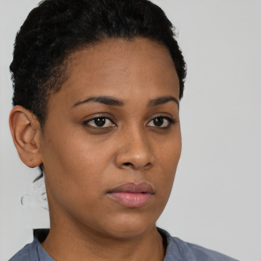 Neutral latino young-adult female with short  brown hair and brown eyes