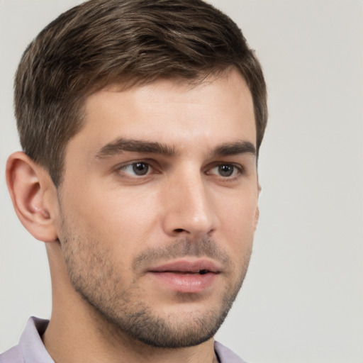 Neutral white young-adult male with short  brown hair and brown eyes