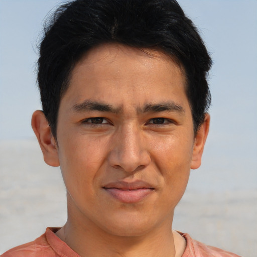 Joyful asian adult male with short  brown hair and brown eyes