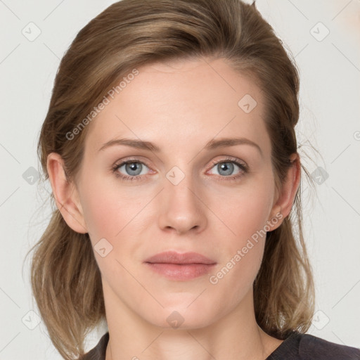 Joyful white young-adult female with medium  brown hair and blue eyes