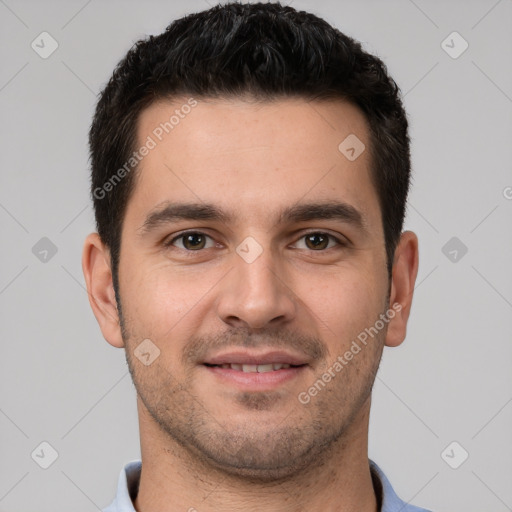 Joyful white young-adult male with short  brown hair and brown eyes