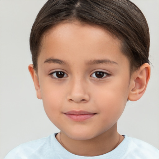 Joyful white child male with short  brown hair and brown eyes