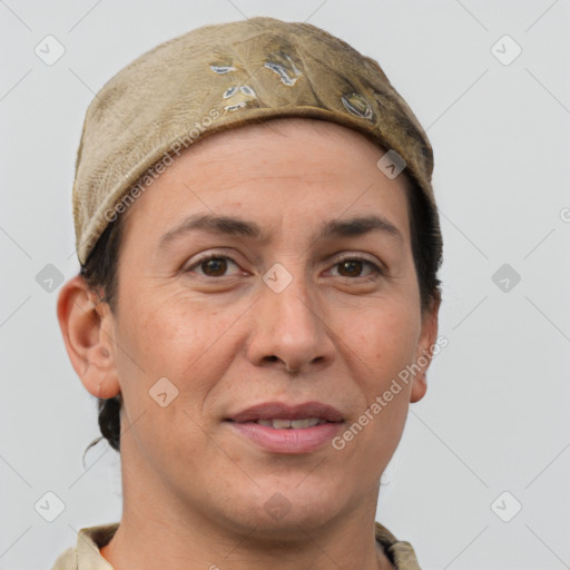 Joyful white adult female with short  brown hair and grey eyes