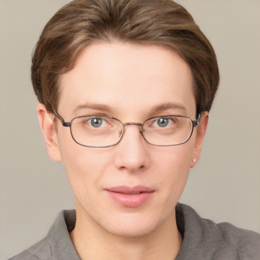 Joyful white adult male with short  brown hair and grey eyes