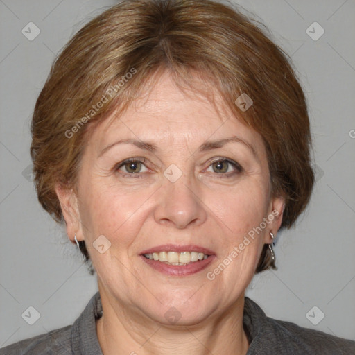 Joyful white adult female with medium  brown hair and blue eyes