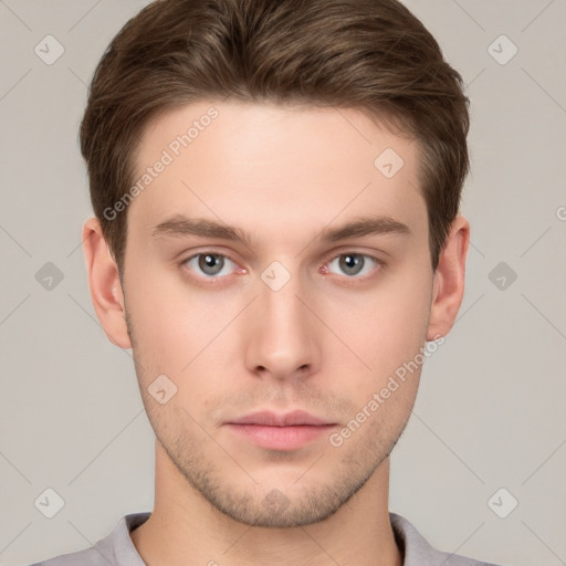 Neutral white young-adult male with short  brown hair and grey eyes