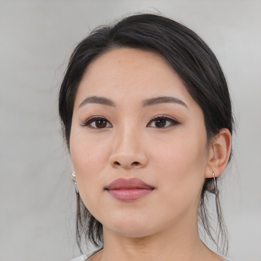 Neutral asian young-adult female with medium  black hair and brown eyes