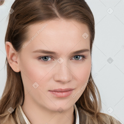 Joyful white young-adult female with long  brown hair and blue eyes