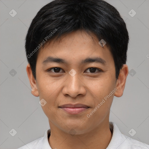 Joyful asian young-adult male with short  black hair and brown eyes