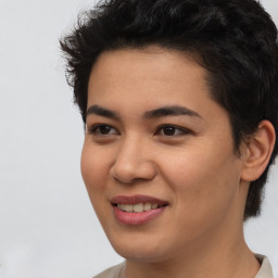 Joyful asian young-adult female with short  black hair and brown eyes