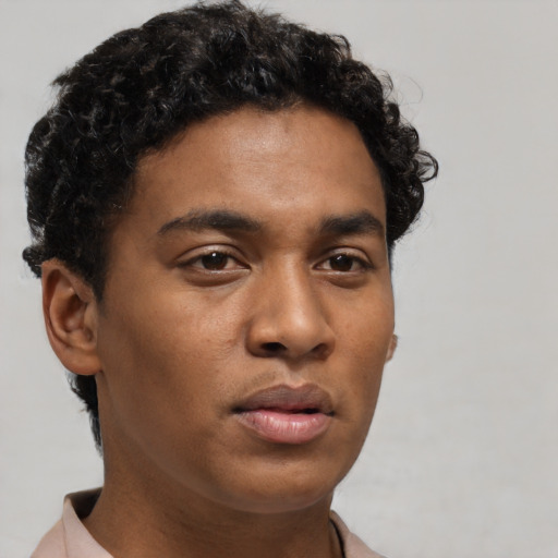 Neutral black young-adult male with short  brown hair and brown eyes