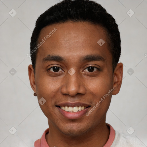 Joyful black young-adult male with short  black hair and brown eyes