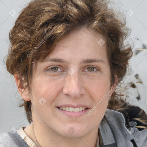 Joyful white adult female with medium  brown hair and blue eyes