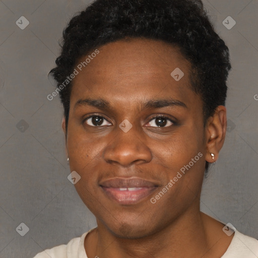 Joyful black young-adult male with short  brown hair and brown eyes