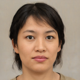 Neutral asian young-adult female with medium  brown hair and brown eyes