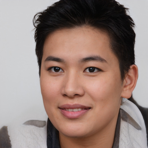 Joyful asian young-adult female with medium  brown hair and brown eyes