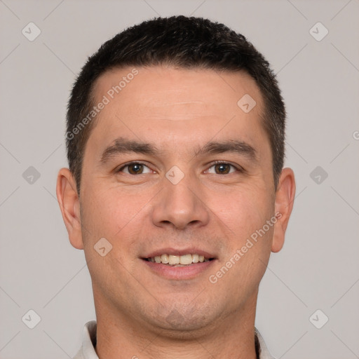 Joyful white young-adult male with short  brown hair and brown eyes