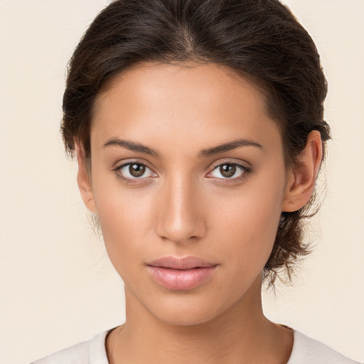 Neutral white young-adult female with medium  brown hair and brown eyes