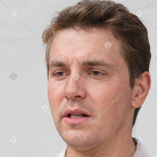 Neutral white adult male with short  brown hair and brown eyes