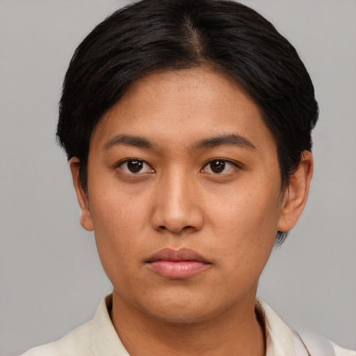 Neutral asian young-adult female with short  black hair and brown eyes