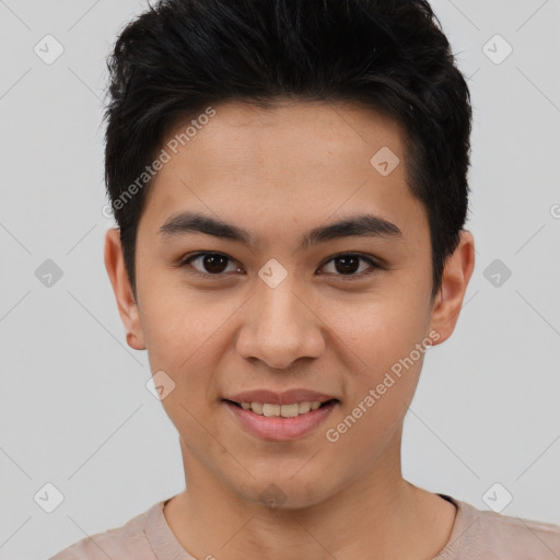 Joyful asian young-adult male with short  black hair and brown eyes