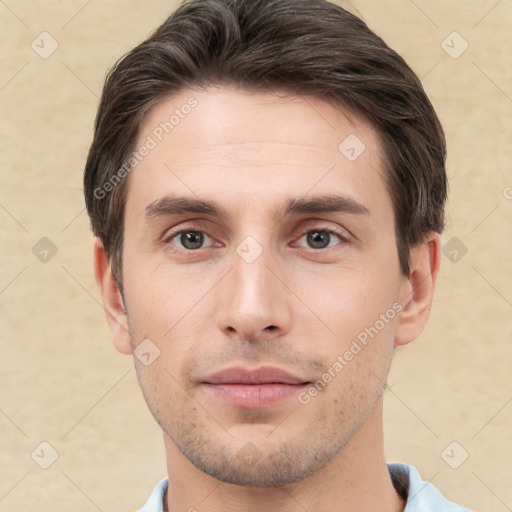 Neutral white young-adult male with short  brown hair and brown eyes