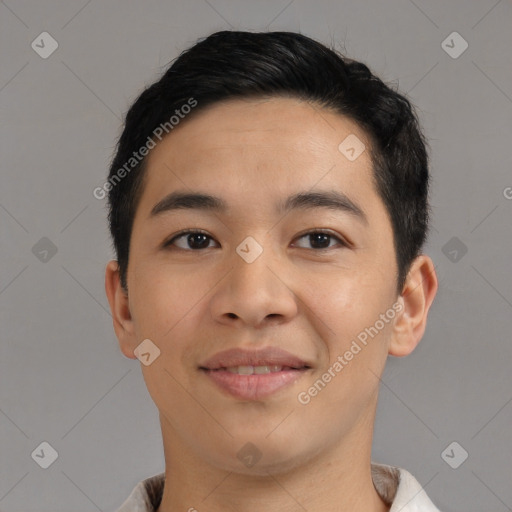 Joyful asian young-adult male with short  black hair and brown eyes