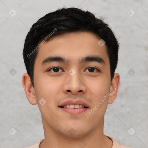 Joyful asian young-adult male with short  black hair and brown eyes