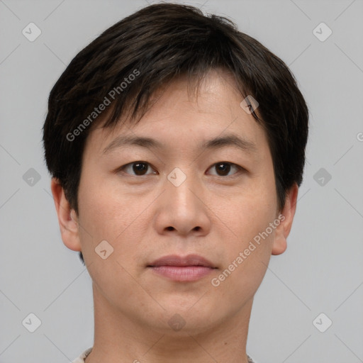 Neutral asian young-adult male with short  brown hair and brown eyes