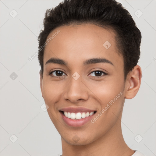 Joyful white young-adult female with short  brown hair and brown eyes