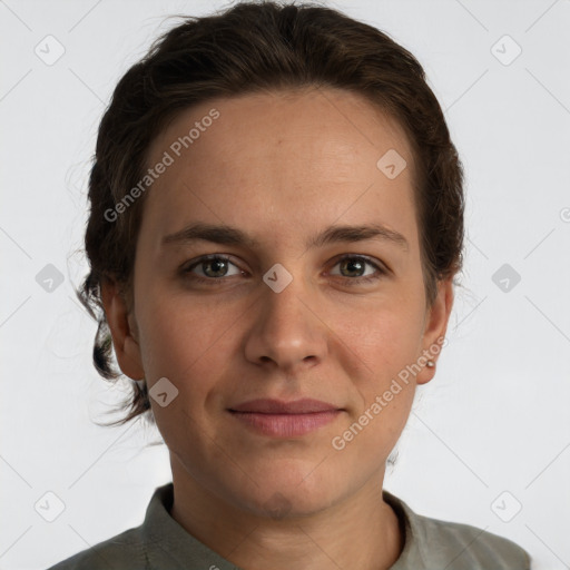 Joyful white adult female with short  brown hair and brown eyes