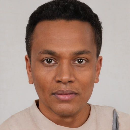 Neutral black young-adult male with short  brown hair and brown eyes