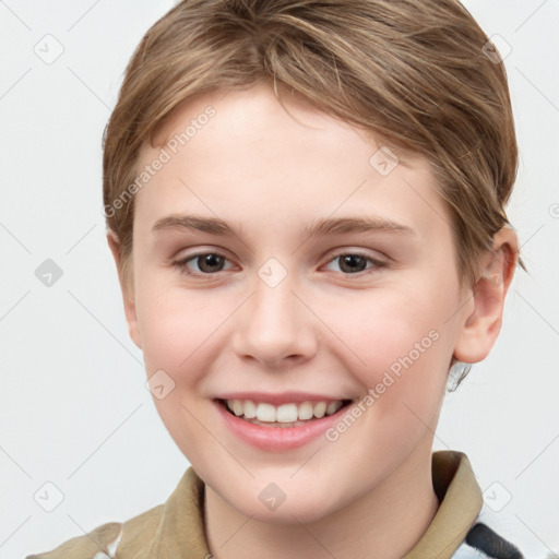 Joyful white child female with short  brown hair and grey eyes