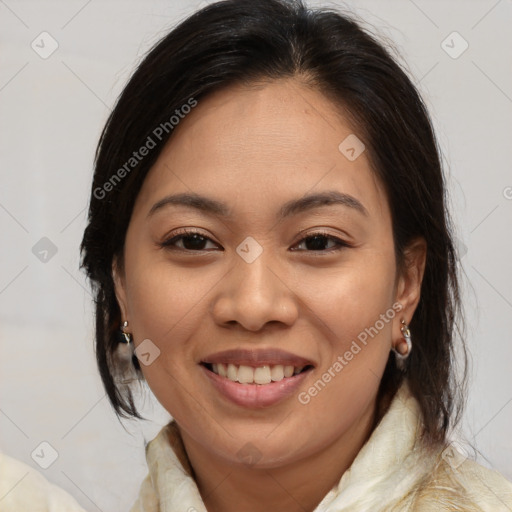 Joyful asian young-adult female with medium  brown hair and brown eyes